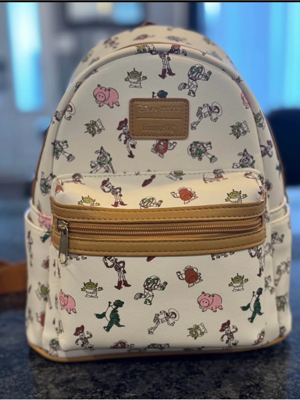Loungefly Cream Toy Story Character Mini Backpack with Tan Accents